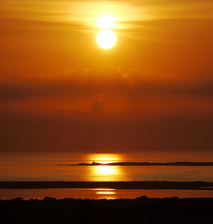 Sunset illuminating lighthouse